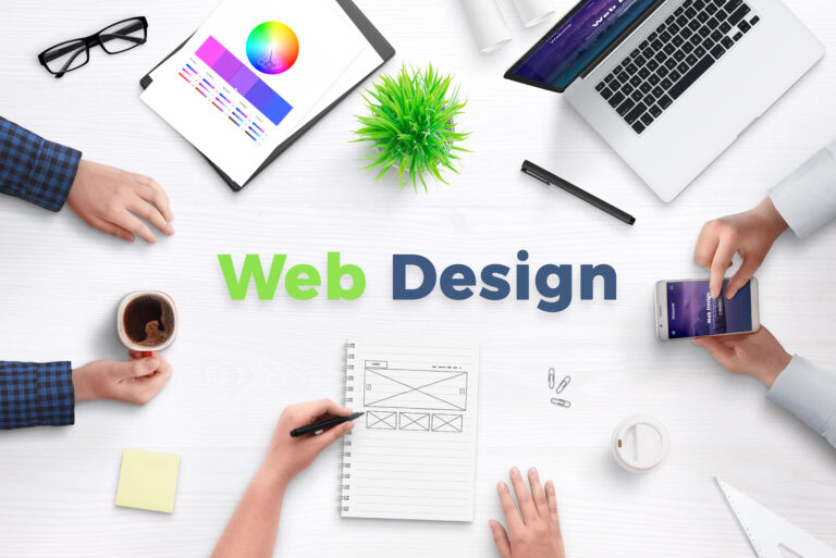 web-design-text-work-desk-surrounded-with-web-development-team-devices-projects-ideas-paper-concept-team-meeting