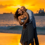 Happy couple enjoying a romantic honeymoon on a Caribbean beach