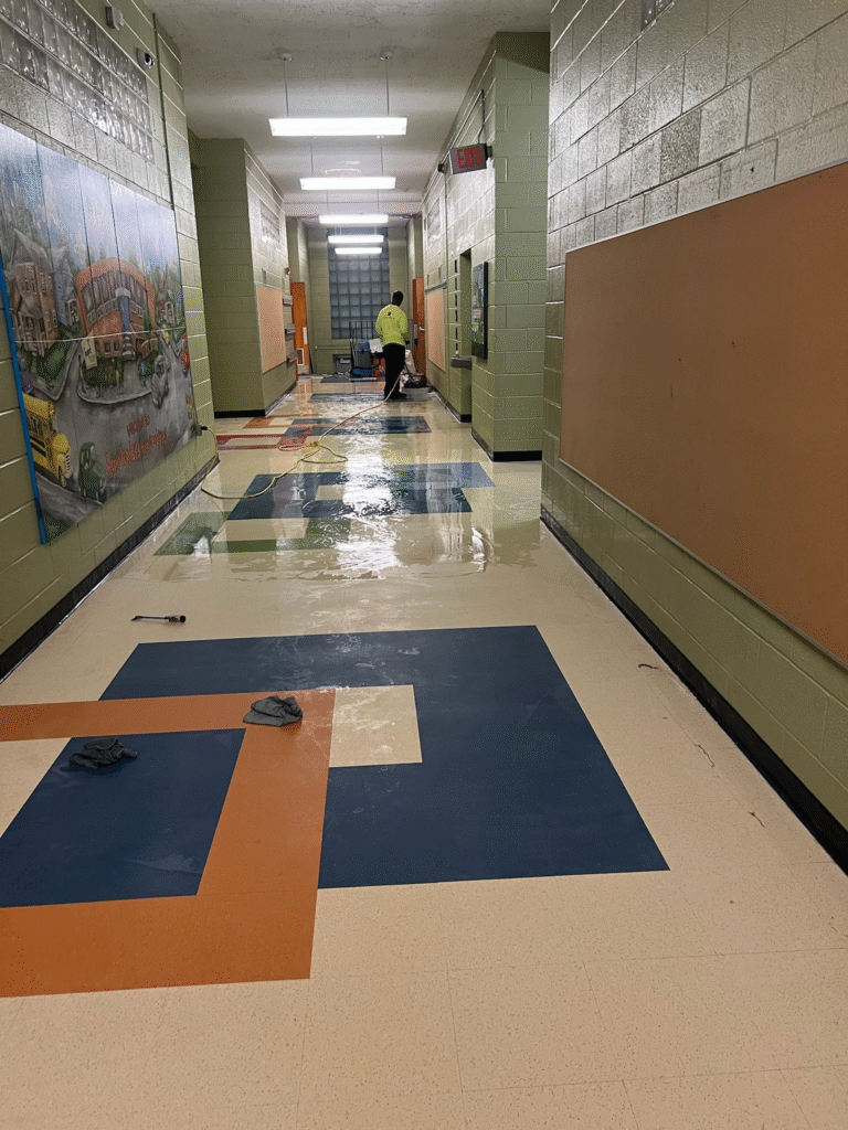 a school hallway being cleaned