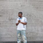 Modern Street Outfit with Who Decides War Patch Jeans